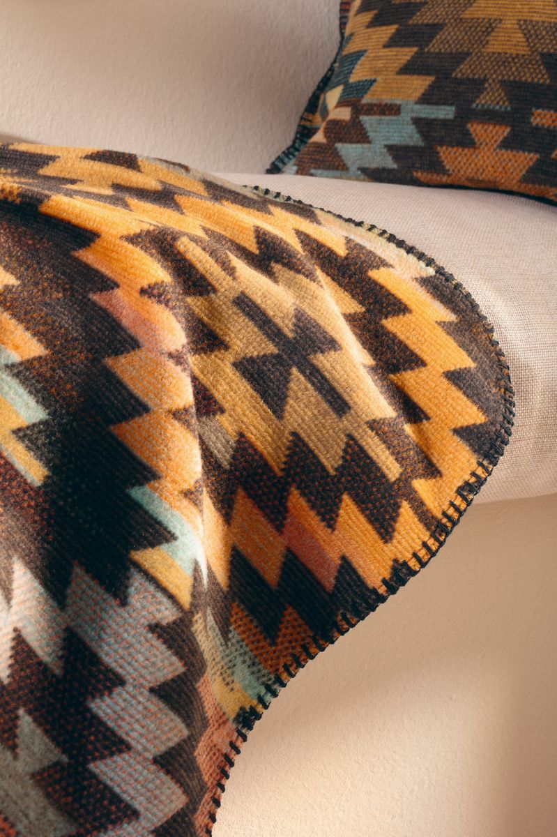 Nomad pledd 150x200, glow